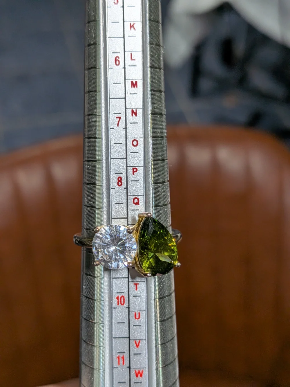 Double Stone Ring with Green Teardrop and Clear Round Gem